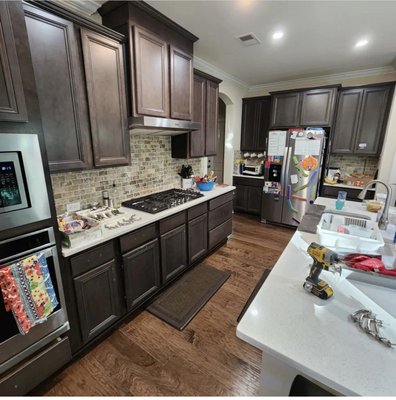 Client got tired of the Dark Color in her Kitchen.