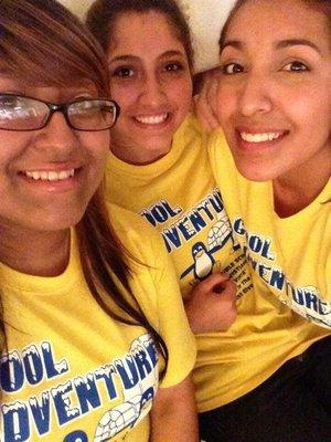 Youth group girls smiling during vacation bible school break.