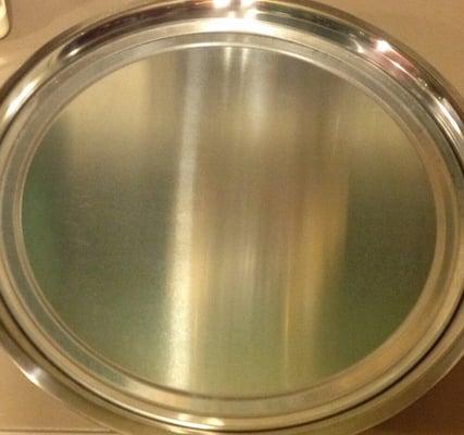 16 qt stainless steel mixing bowl $9.00. A 16" pizza pan is inside it (blocking reflections from my kitchen).