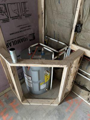 40 gallon water heater under a kitchen countertop