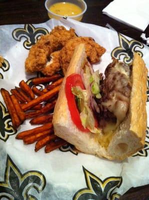 Cheesesteak and sweet potato fries.   Shared Chicken fingers,  the best we've had!