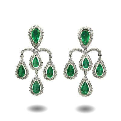 Dangling Emerald & Diamond Earrings. Accompanied by Emeralds weighing 13.90 carats and 6.60 carats of Diamonds set in 18 karat White Gold.