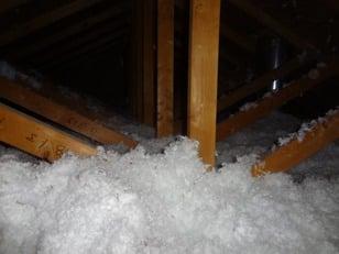 After: The attic is now properly insulated with blown in insulation.