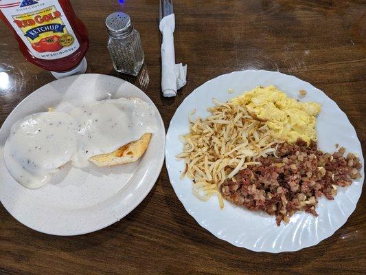 Corned beef hash, hash browns, scrambled eggs, biscuits and gravy - LOTS of gravy, as it should be