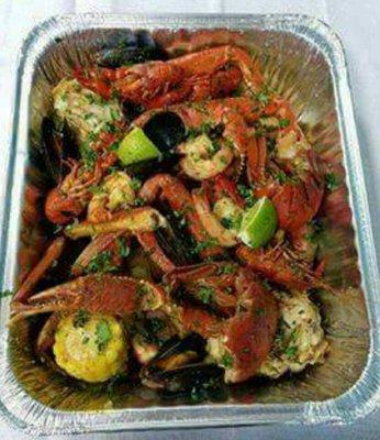 $38.00 Seafood Platter, comes with lobster, snow crabs, mussels, crawfish, shrimp, corn, potatoes and lime....