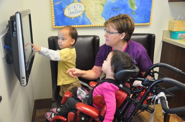 Our waiting rooms have touch screen computers for kids to play with learning software.