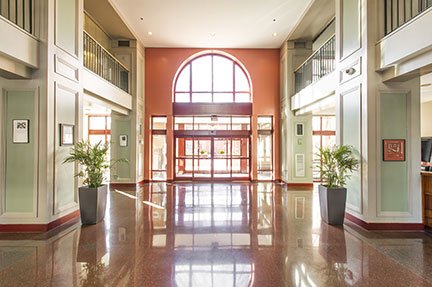 Tent City Apartments features large, bright community spaces, including: lobby, community function room and kitchen, and laundry.