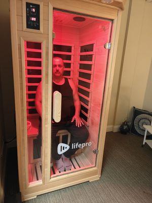 A client enjoying the infrared Sauna