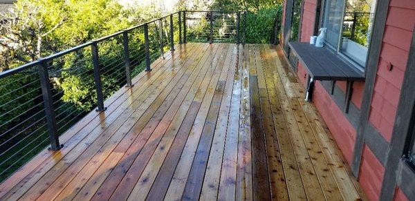 2 x 6 cedar deck top installed on new ground up deck rebuild