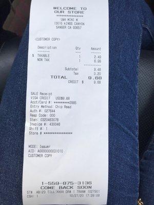 Receipt for being charged $6.99 for a gallon of milk.