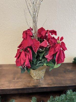 They so busy taking care of your teeth they forget to water this poor sad little Poinsettia.