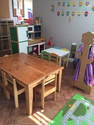 Arts and crafts table. Play pretend area