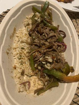 Brown rice, Barbacoa and fajitas bowl.