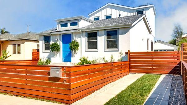 Horizontal Stained Wood Privacy Fence.