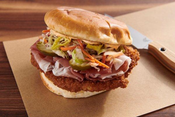 Pork Tenderloin 
Panko Crusted Pork/Prosciutto/Pepperoncini Slaw/Pickles/Calabrian Chili Mayo/Brioche Bun