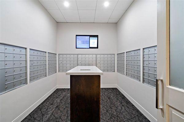 Every apartment has a mailbox in the mailroom conveniently located across from the elevators.