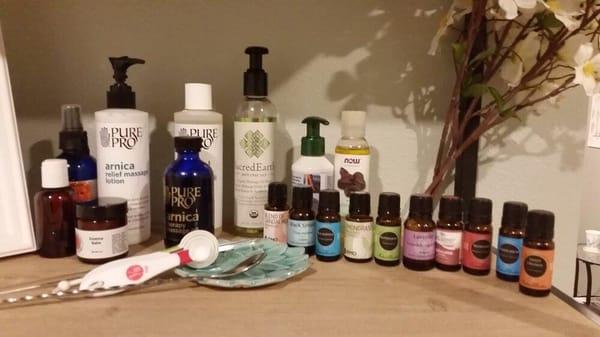 A lovely collection of essential oils, arnica oil, jojoba oil, etc.