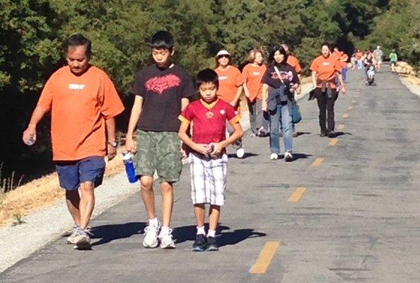 Walking with Dr. Leung Coaching the importance of exercise