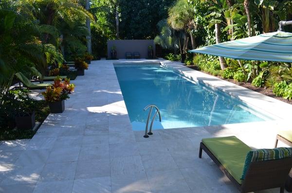 Longboat Key lap pool and tropical retreat. With auto pool cover, geothermal efficiency, travertine deck. A beautiful oasis.