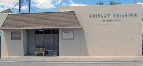 Storefront photo. Office is in the Shipley Building.