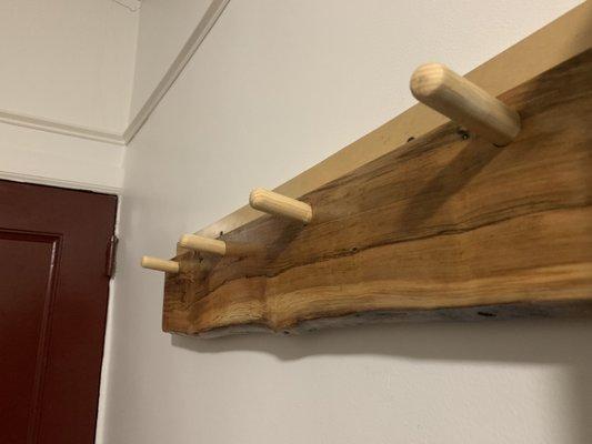 This is a custom coat rack made with spalted maple with a nice heavy shellac finish