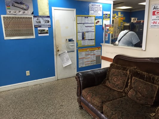 Office & waiting area with television and AC.