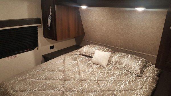 Queen size bed with underneath storage.