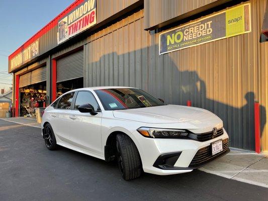 Brand new Honda Civic. 
Solar Gard window film.