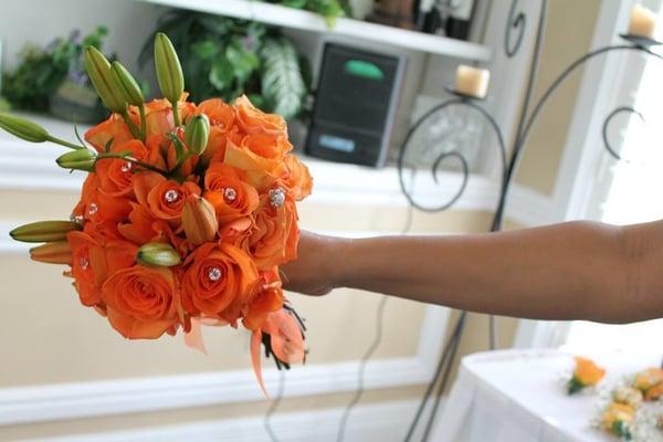 Bridal bouquet orange roses.