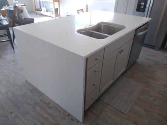 Quartz counter top island with waterfall.