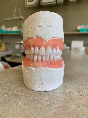 Dentures made by master technicians in our on-site lab at Denture and Dental Services in Destin, Florida.