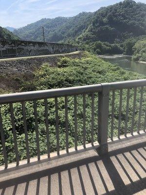 Crossing the river into Matewan, W.V.  The river floods so badly they had to build a flood wall to protect the town.