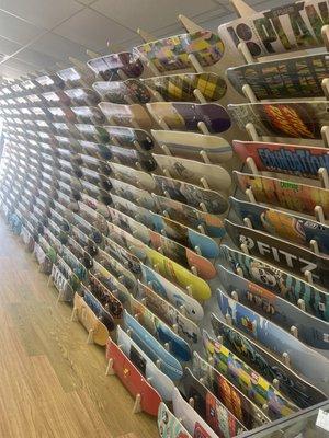 Our skate wall stacked with over  150 boards !