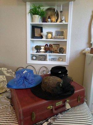 Bedroom with vintage hats