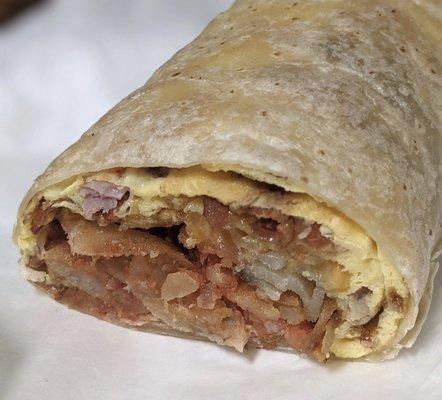 Breakfast burrito was neatly rolled and tasted good