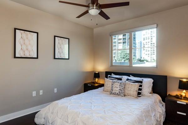 Modern colors in this new apartment home with ceiling fan, roller shades and designer color schemes.