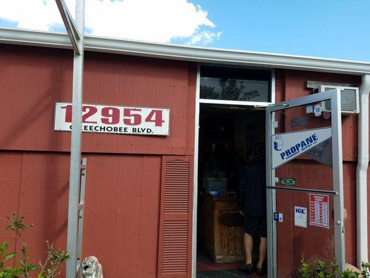 Address and front entrance, on the west side of Red Barn building