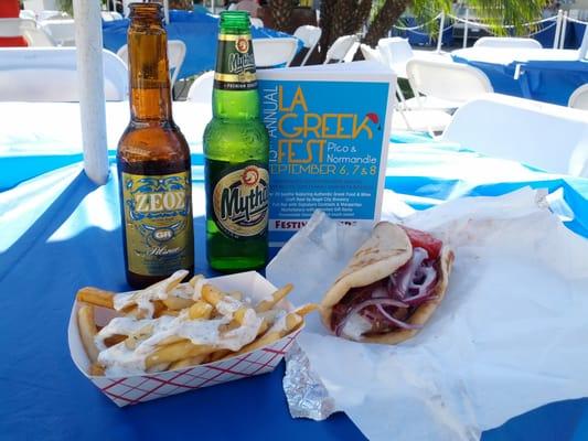 Gyro, fries with tzatziki sauce (very tasty), and a couple of Greek beers.