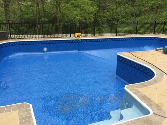 Elite True L with vinyl liner and custom grinding on concrete deck