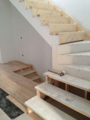 Install new hardwood stairs and flooring