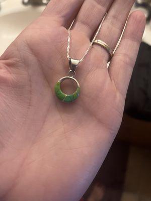 Double sided pendant with opal and gaspiate.