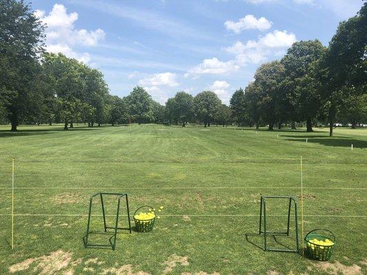 Driving range. Free daily to members. Maxes around 200, but you can hit woods if no one is playing the greens behind if you really need to.