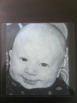 With our state of the art Laser Engraver, we can put your special photo onto marble or granite for that special keepsake.