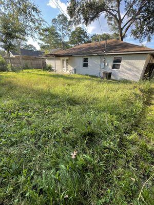 This home had not been mowed in months and we cleaned it up before it went on the market