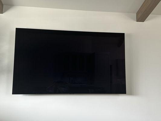 TV mounted on wall