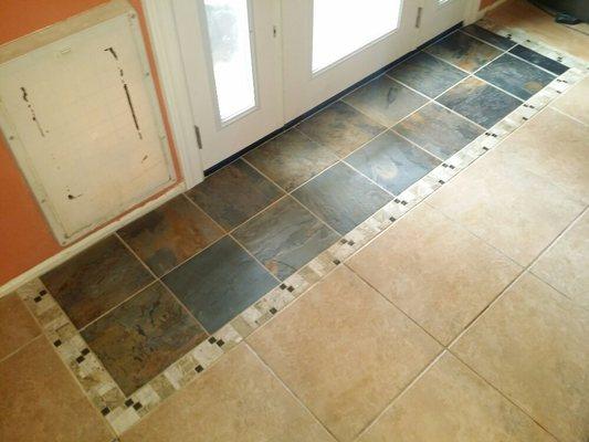 Original tile had cracked from settling at back patio door.
I removed cracked tile and installed slate with a border tile design.