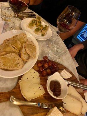 Focaccia in the back, cheese sampler with bread in the front