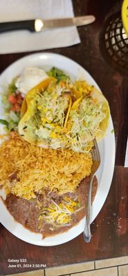 Fish Taco Plate - the corn tacos are made fresh like everything else! Rice, refried beans, salad, sour cream.