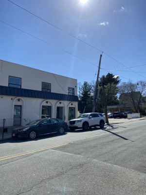 Street parking, parking lot in the rear, and municipal parking across the street