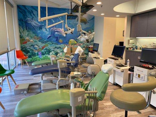 Our open dental area for kids  and beautiful sea of smiles mural